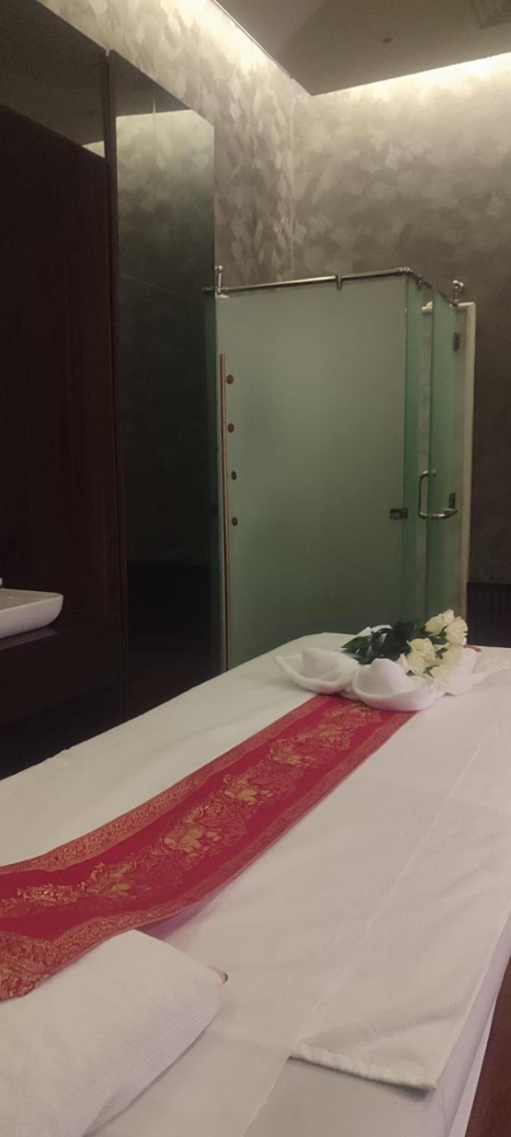 Waterfront Hotel Apartment Lusail Екстериор снимка A shower cubicle in a Thai spa